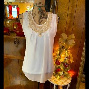 Vintage Nishangnvyl tired sleeveless blouse.